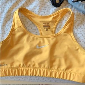 Yellow Nike sports bra